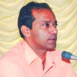 Dr. Satish Tiwari